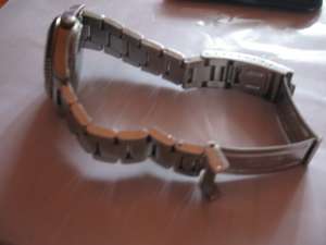 ROLEX  PERPETUAL DATE ADJUST