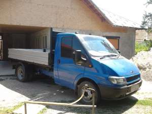 EXECUT TRANSPORT BASCULABIL LA PRETURI DE CRIZA
