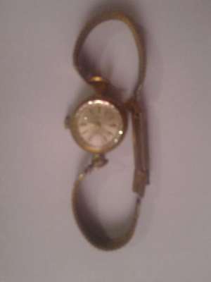 Vand ceas vechi plcat cu aur marca Rado ceasul merge perfect si are o vechime de peste 35 ani