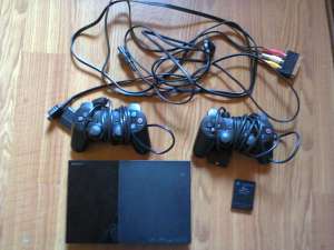 Playstation 2 slim + jocuri, 