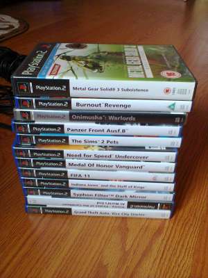 Playstation 2 slim + jocuri, 
