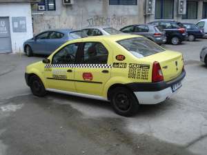 DACIA LOGAN MODEL 2008,  1.4 BENZINA + GPL
	MODEL KISS FM *** ECHIPAT TAXI,  FARA STATIE