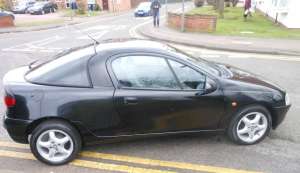dezmembrez opel tigra 1998